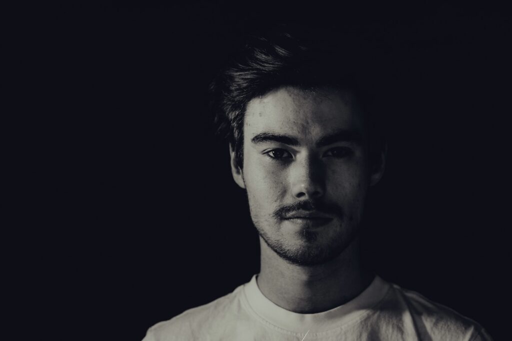 man in white crew neck shirt
